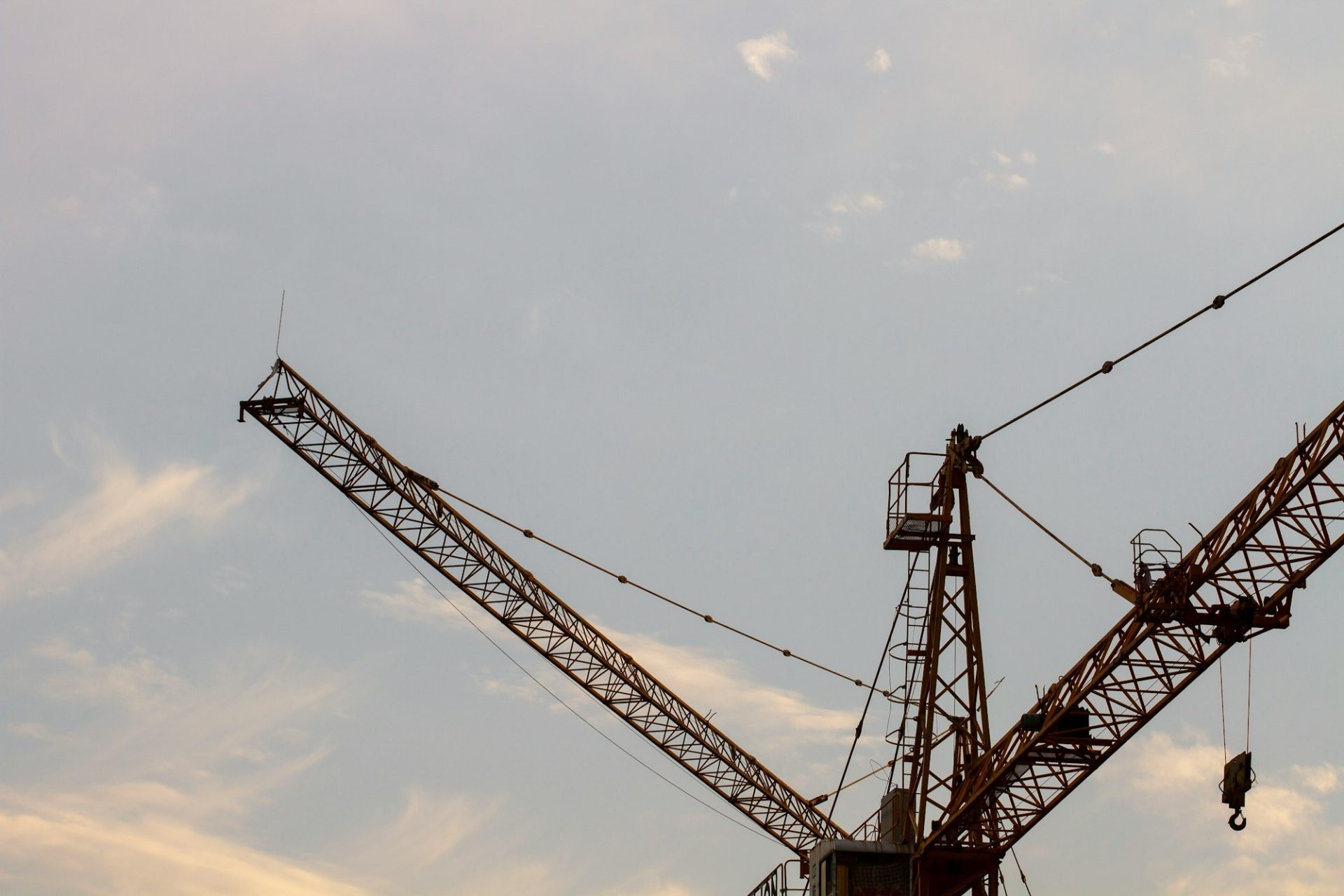 a crane with a blue sky
